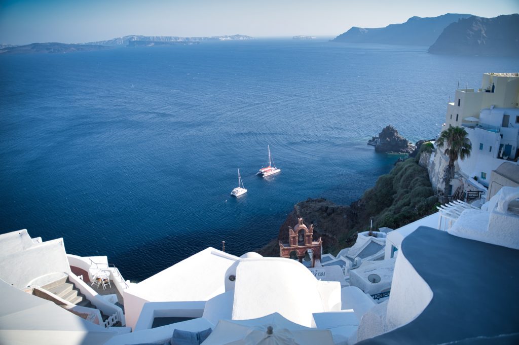 View of blue sea from buildings in Greece a great place for corporate incentive trips